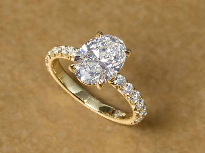 Oval-shape diamond ring in gold setting